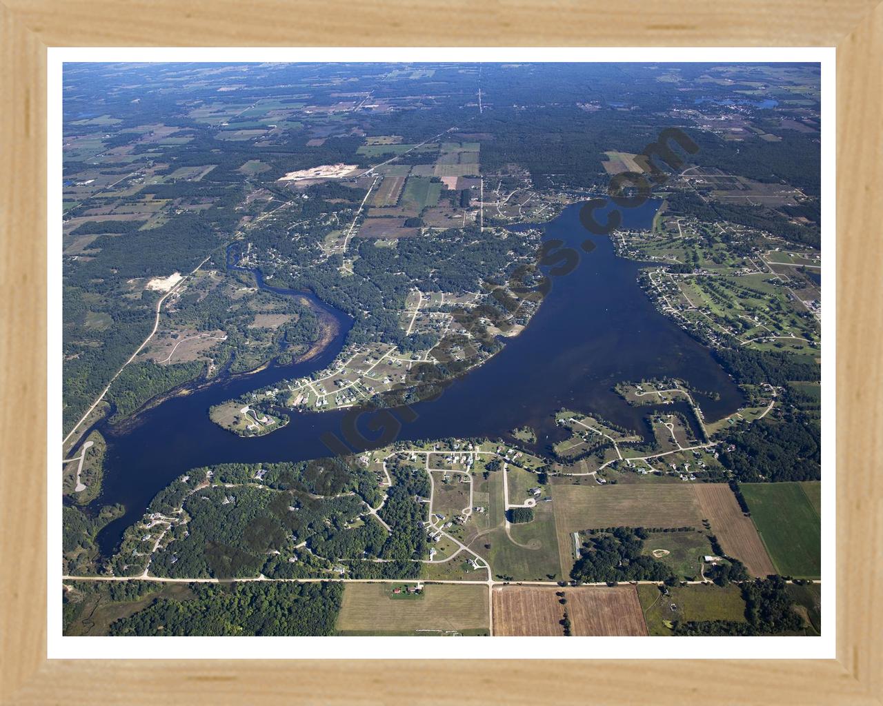 Aerial image of [5624] Lake Isabella in Isabella, MI with Natural Wood frame