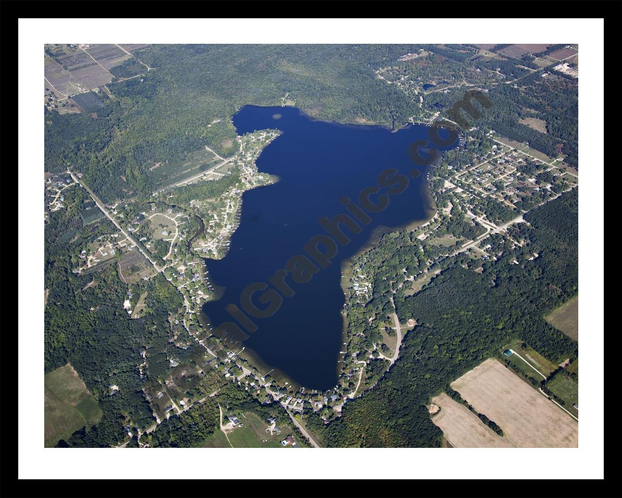 Aerial image of [5625] Coldwater Lake in Isabella, MI with Black Metal frame