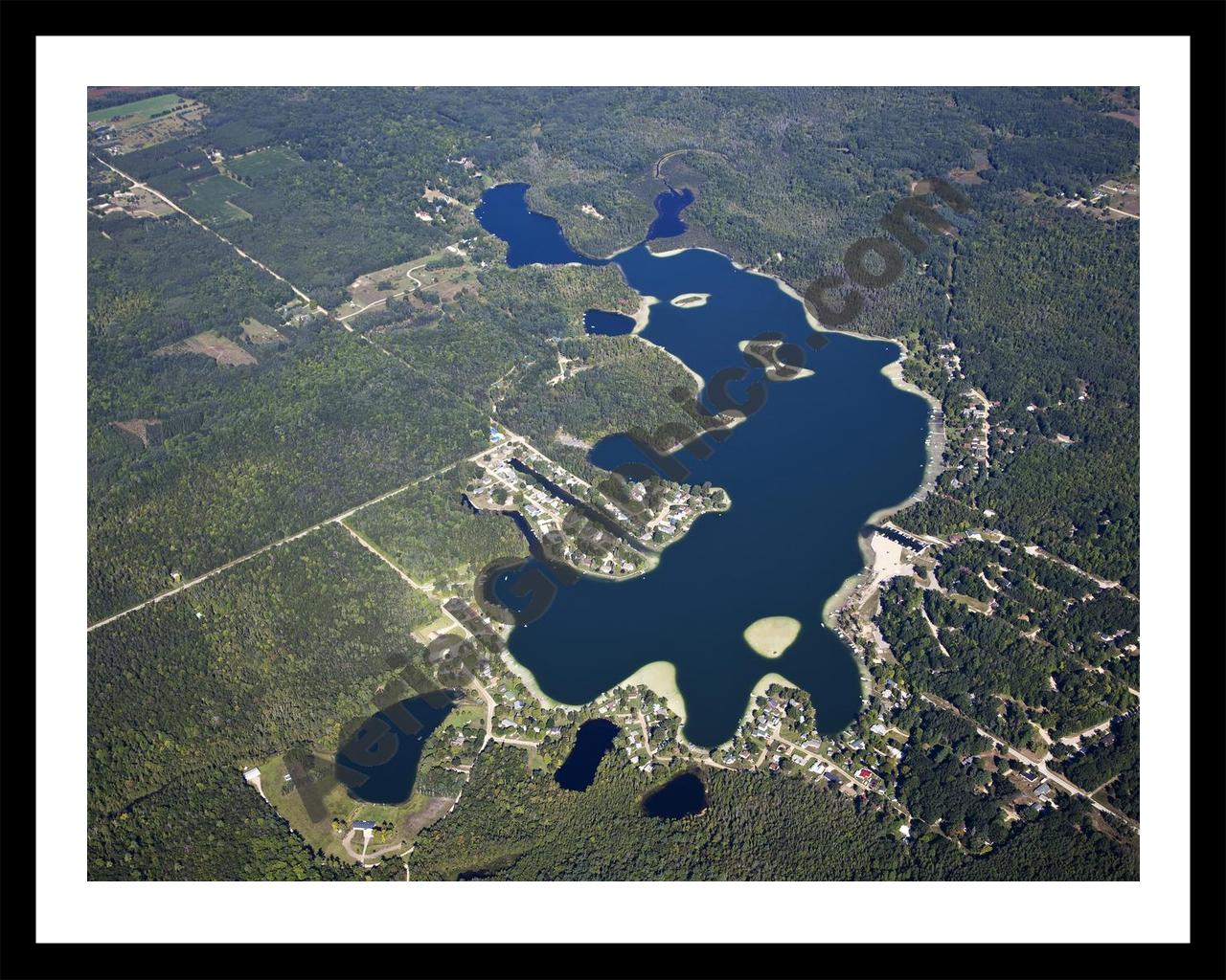 Aerial image of [5628] Littlefield Lake in Isabella, MI with Black Metal frame