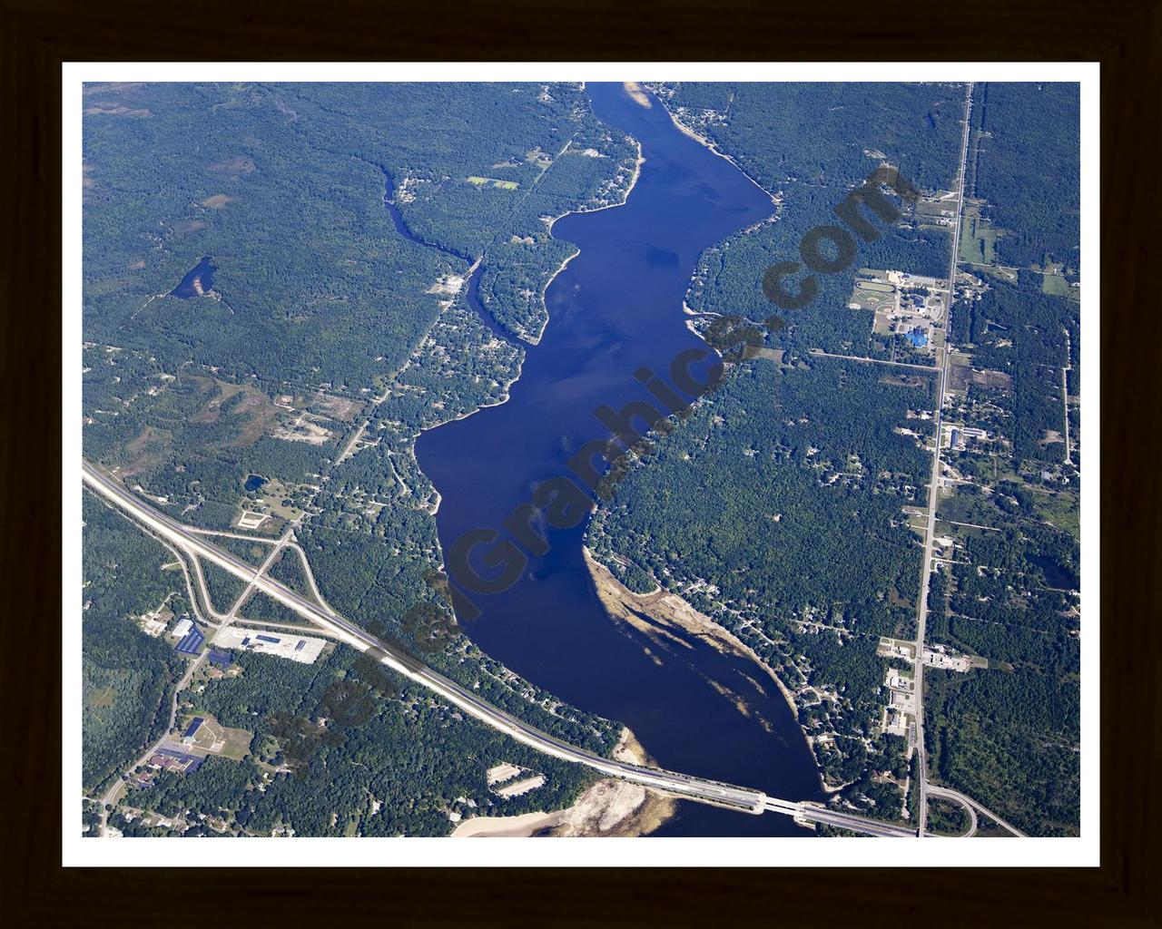 Aerial image of [5630] Sanford Lake in Midland, MI with Black Wood frame