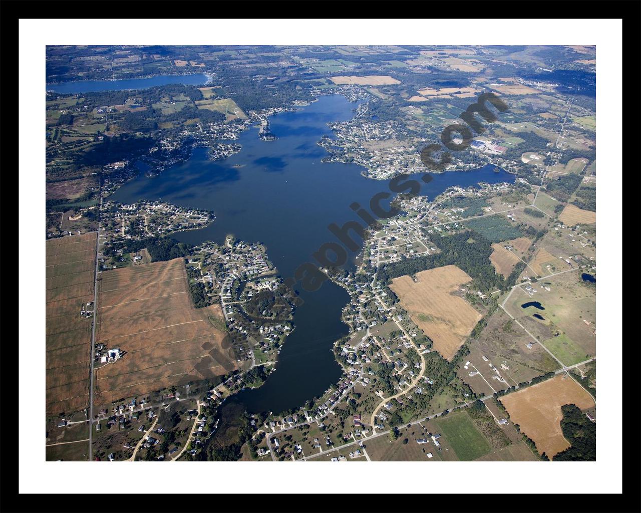 Aerial image of [5647] Columbia Lake in Jackson, MI with Black Metal frame