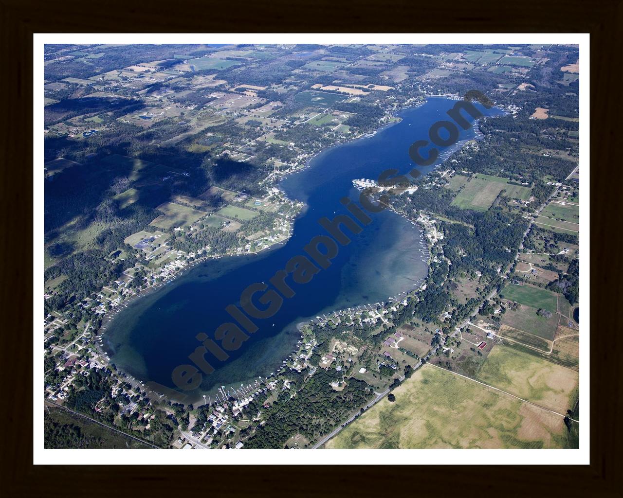 Aerial image of [5648] Clark Lake  in Jackson, MI with Black Wood frame