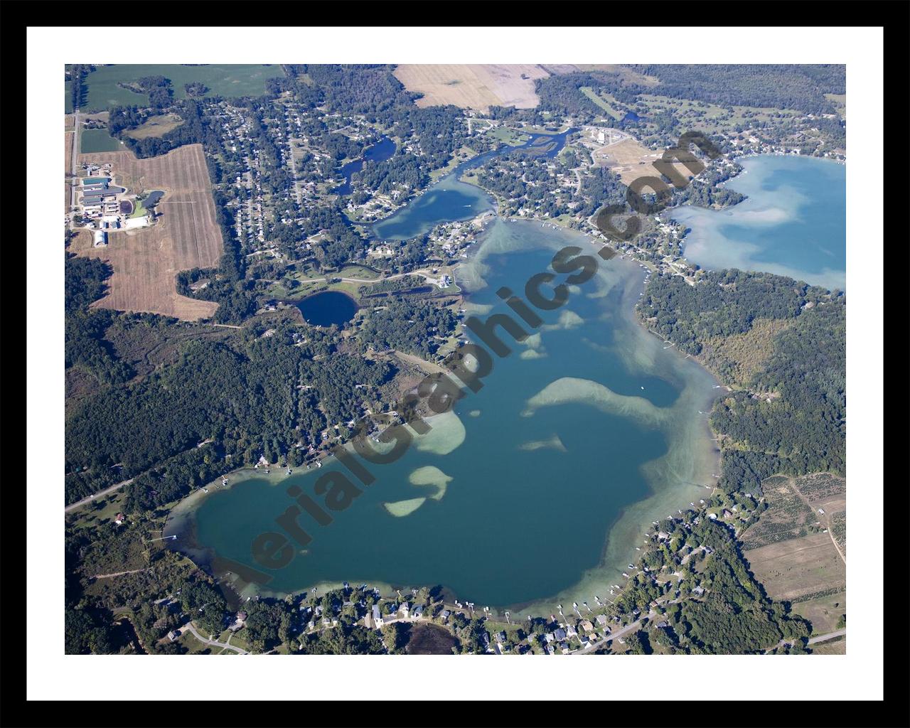 Aerial image of [5651] Farwell Lake in Jackson, MI with Black Metal frame