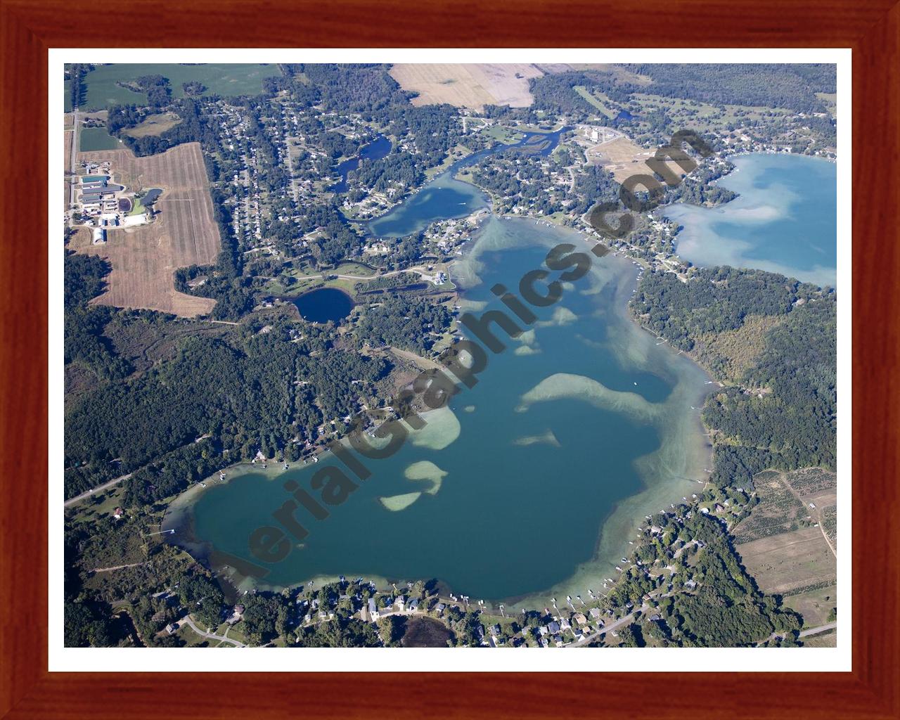 Aerial image of [5651] Farwell Lake in Jackson, MI with Cherry Wood frame