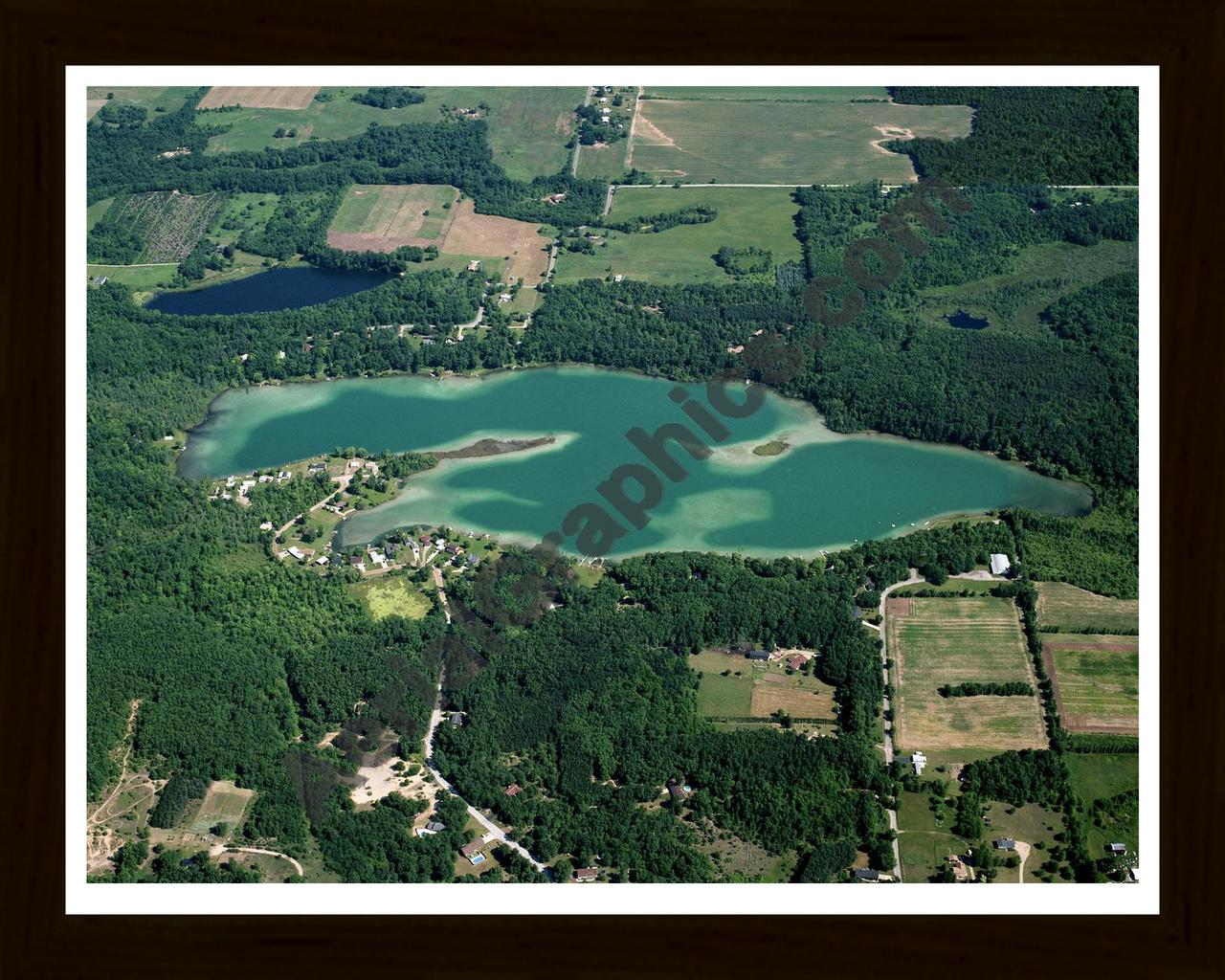 Aerial image of [5678] Burgess Lake in Montcalm, MI with Black Wood frame