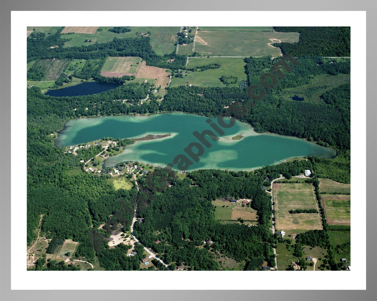 Aerial image of [5678] Burgess Lake in Montcalm, MI with Silver Metal frame