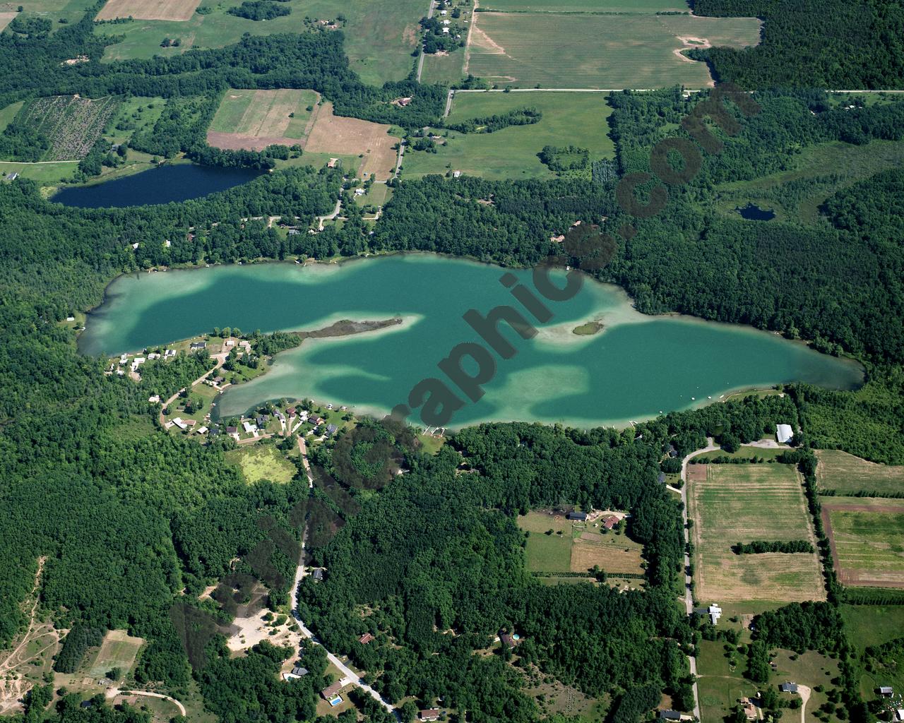 Aerial image of [5678] Burgess Lake in Montcalm, MI with Canvas Wrap frame