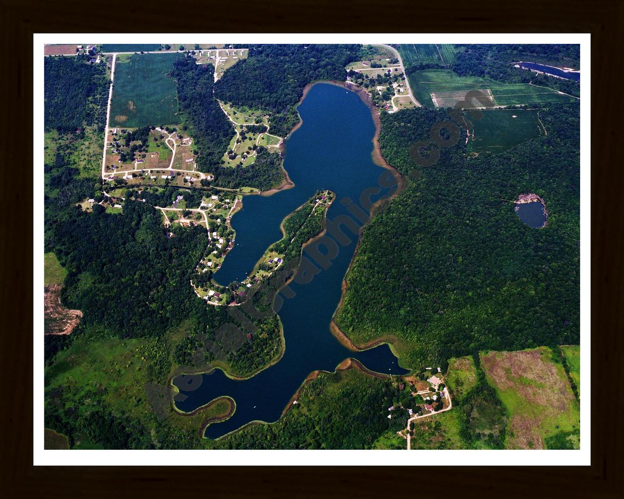 Aerial image of [5686] Dragon Lake in Branch, MI with Black Wood frame