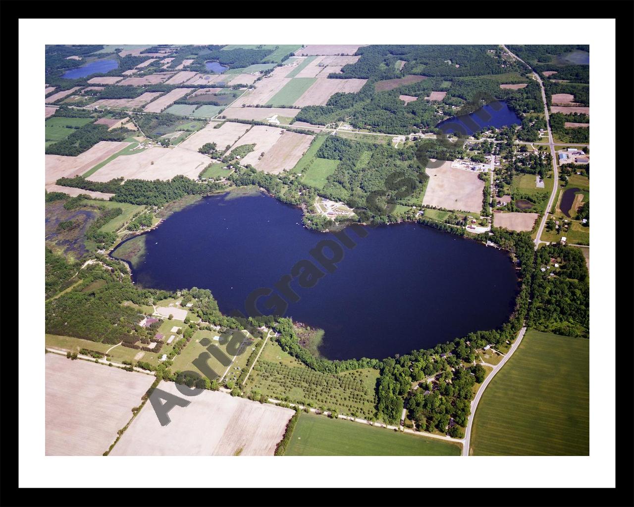 Aerial image of [5691] Bair Lake in Cass, MI with Black Metal frame