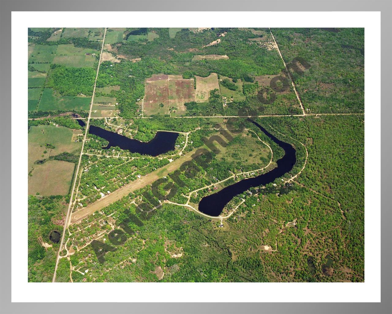 Aerial image of [5701] Lake Windaga in Isabella, MI with Silver Metal frame