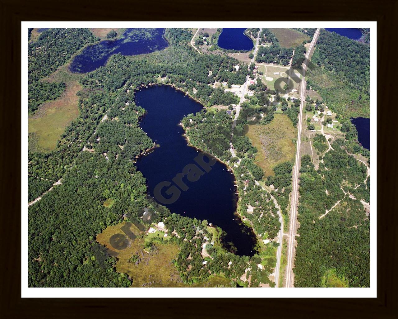 Aerial image of [5711] Bitely Lake in Newaygo, MI with Black Wood frame