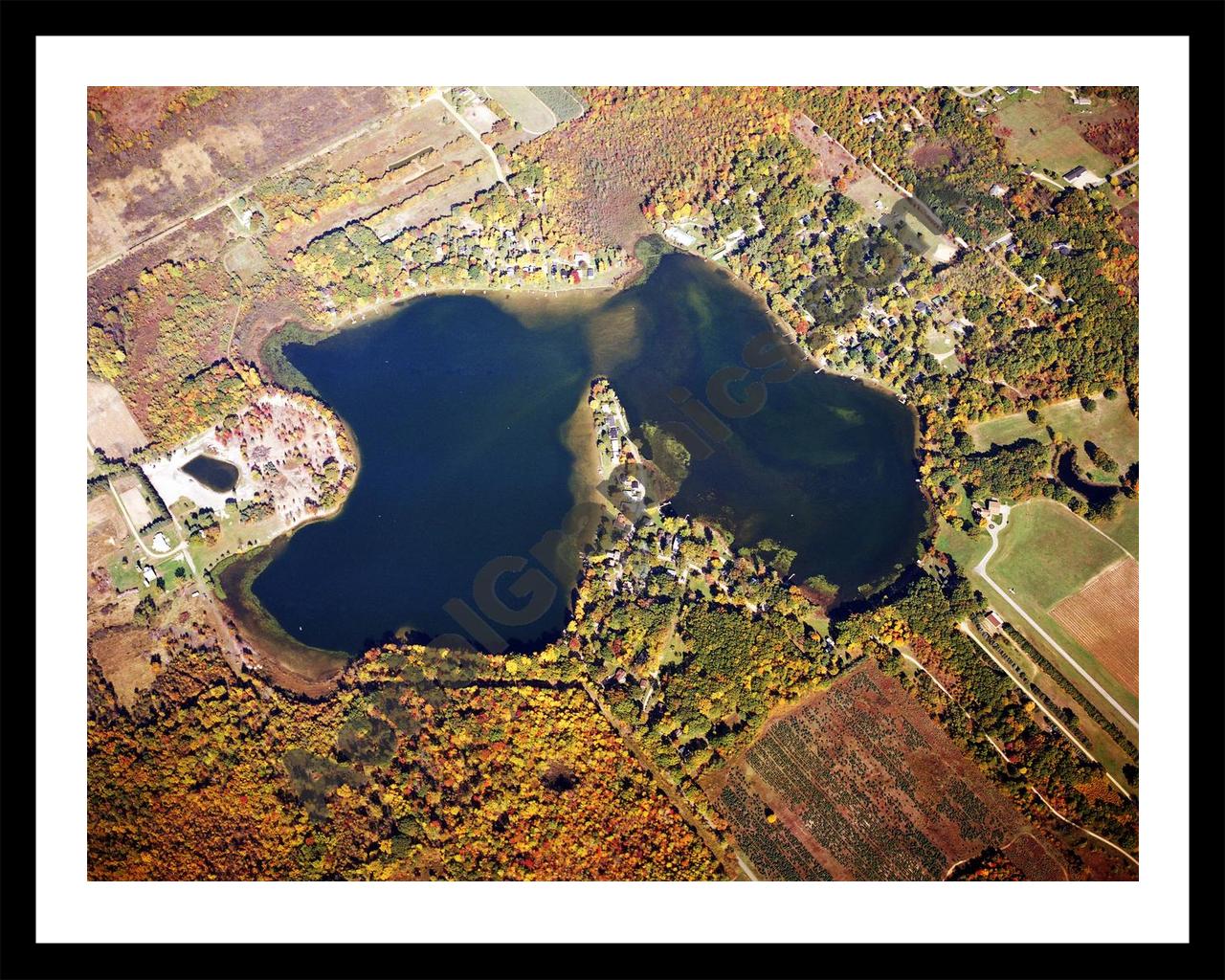 Aerial image of [5720] Brownwood Lake in Van Buren, MI with Black Metal frame