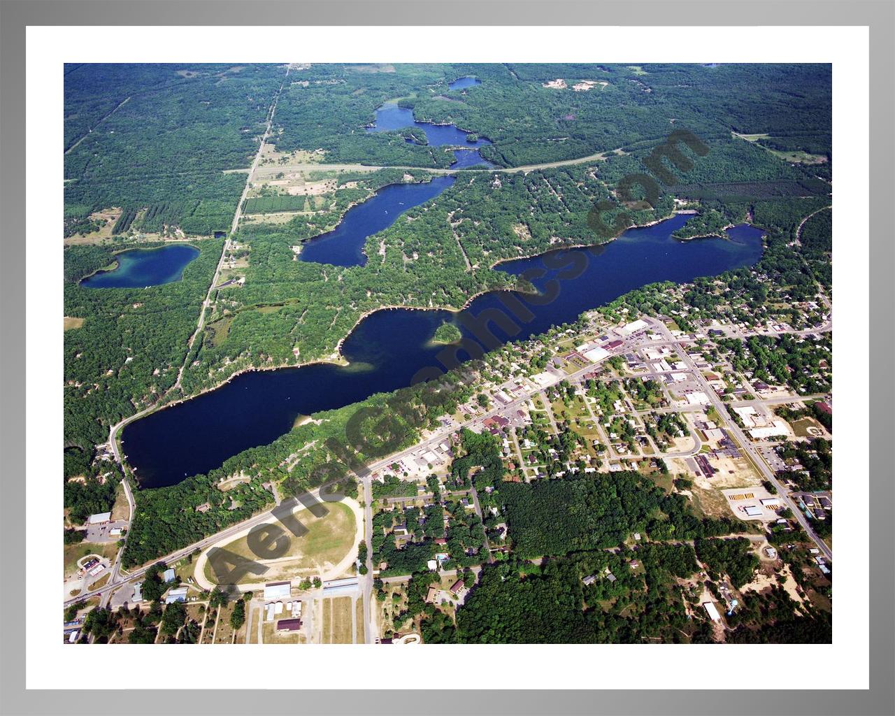 Aerial image of [5722] Budd Lake in Clare, MI with Silver Metal frame