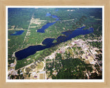 Aerial image of [5722] Budd Lake in Clare, MI with Natural Wood frame