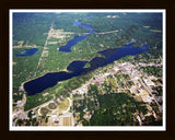 Aerial image of [5722] Budd Lake in Clare, MI with Black Wood frame