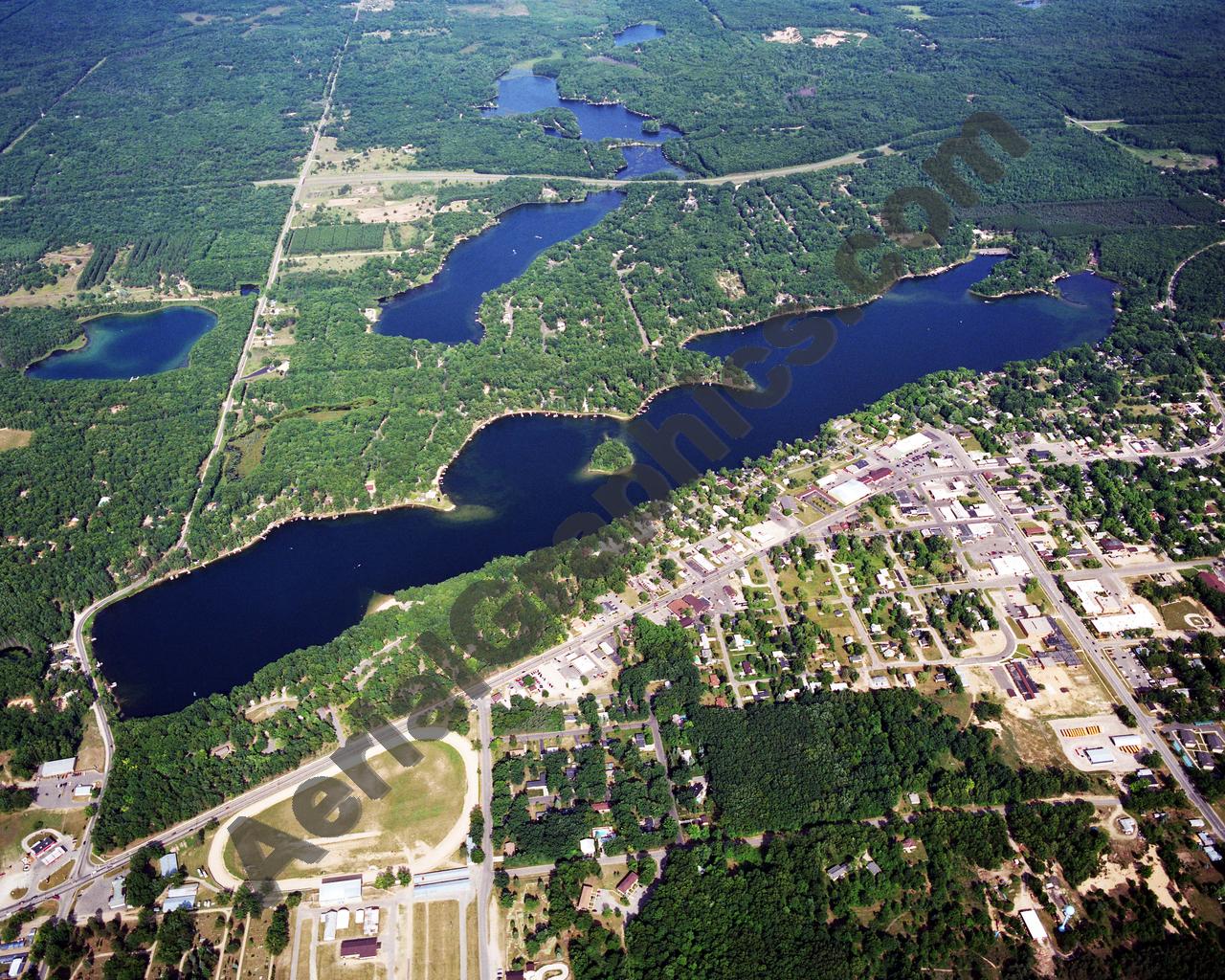 Aerial image of [5722] Budd Lake in Clare, MI with Canvas Wrap frame