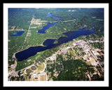 Aerial image of [5722] Budd Lake in Clare, MI with Black Metal frame