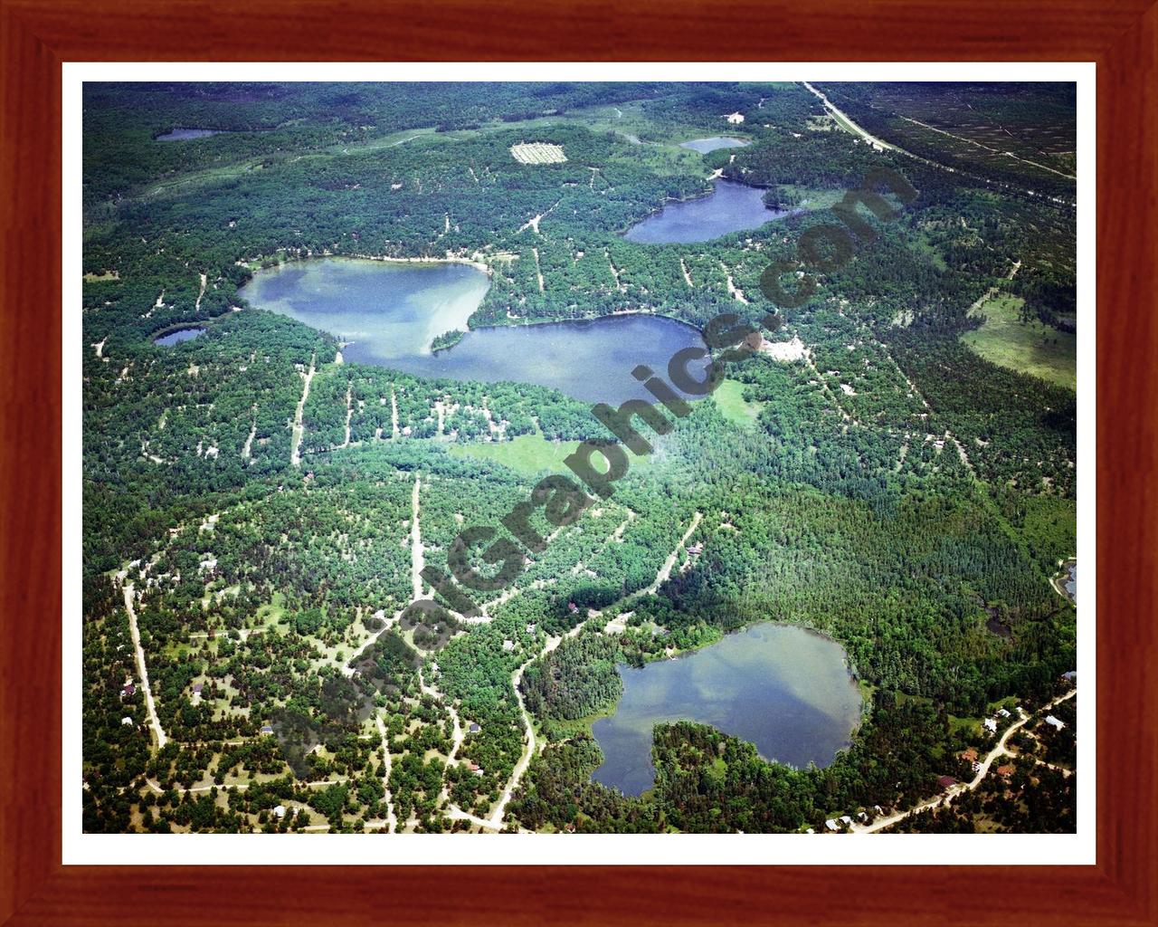 Aerial image of [5729] Canada Creek Ranch in Montmorecy, Mi with Cherry Wood frame