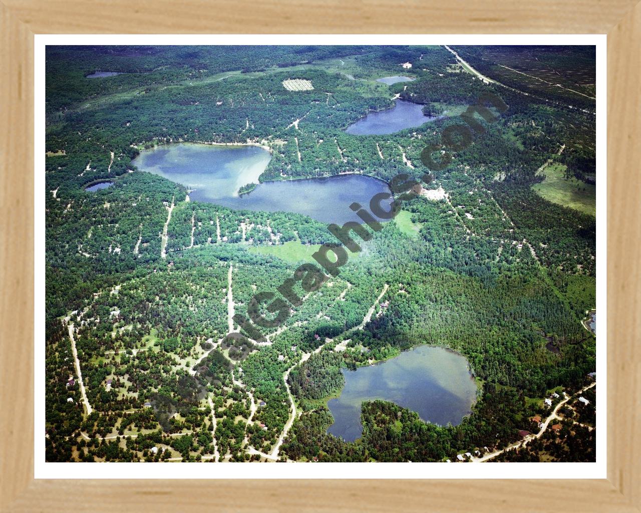 Aerial image of [5729] Canada Creek Ranch in Montmorecy, Mi with Natural Wood frame