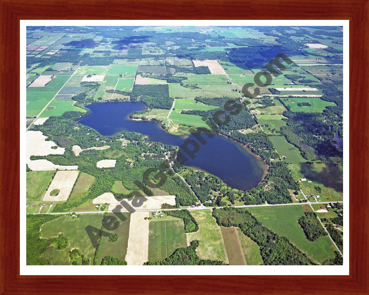 Aerial image of [5736] Clifford Lake in Montcalm, MI with Cherry Wood frame