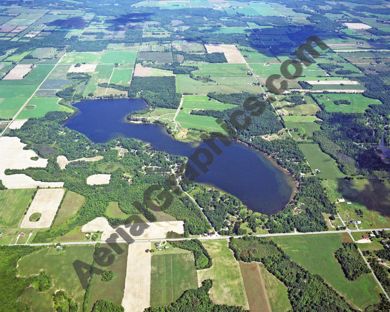 Aerial image of [5736] Clifford Lake in Montcalm, MI with Canvas Wrap frame