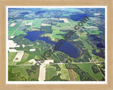 Aerial image of [5736] Clifford Lake in Montcalm, MI with Natural Wood frame