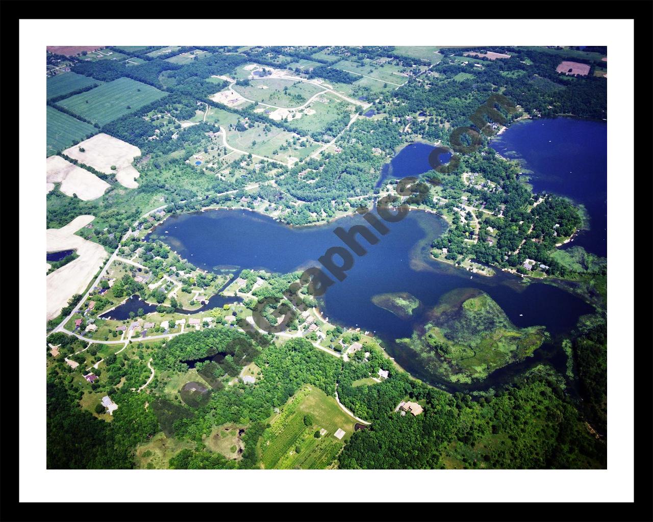 Aerial image of [5737] Coon Lake in Livingston, MI with Black Metal frame