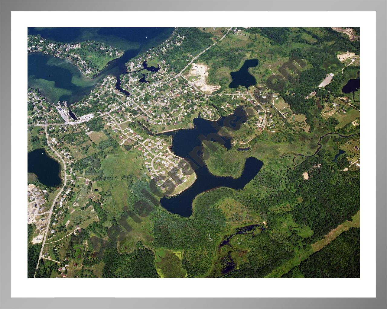 Aerial image of [5740] Crooked Lake in Genesee, MI with Silver Metal frame