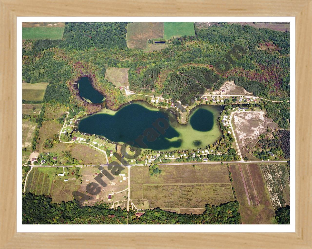 Aerial image of [5741] Crooked Lake in Montcalm, MI with Natural Wood frame