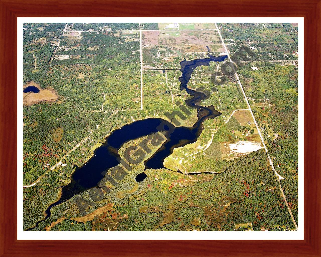 Aerial image of [5743] Crooked Lake in Montmorency, MI with Cherry Wood frame