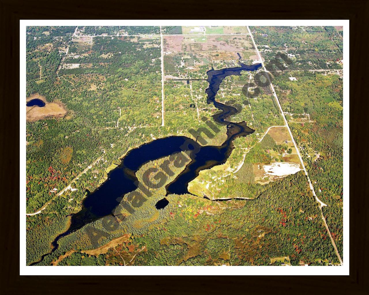 Aerial image of [5743] Crooked Lake in Montmorency, MI with Black Wood frame