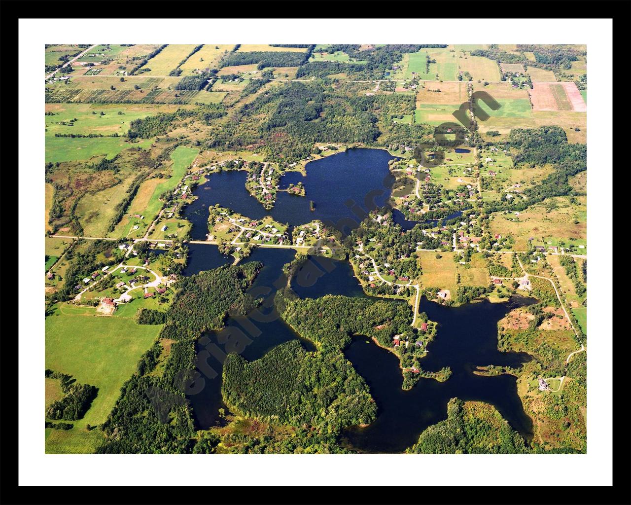 Aerial image of [5746] Cummings Lake (East) in Shiawassee, MI with Black Metal frame