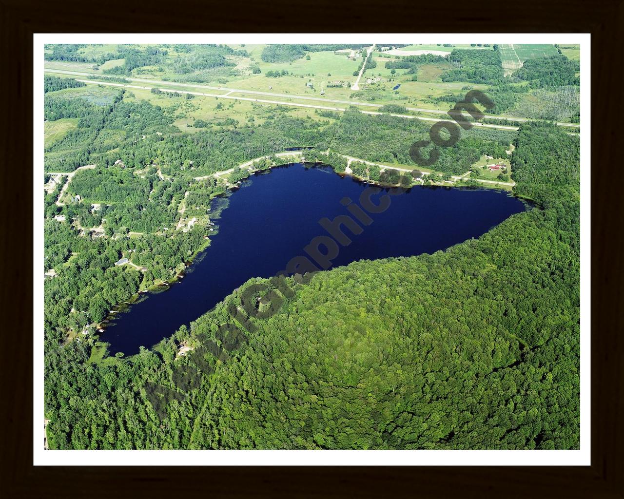 Aerial image of [5750] Diamond Lake in Osceola, MI with Black Wood frame