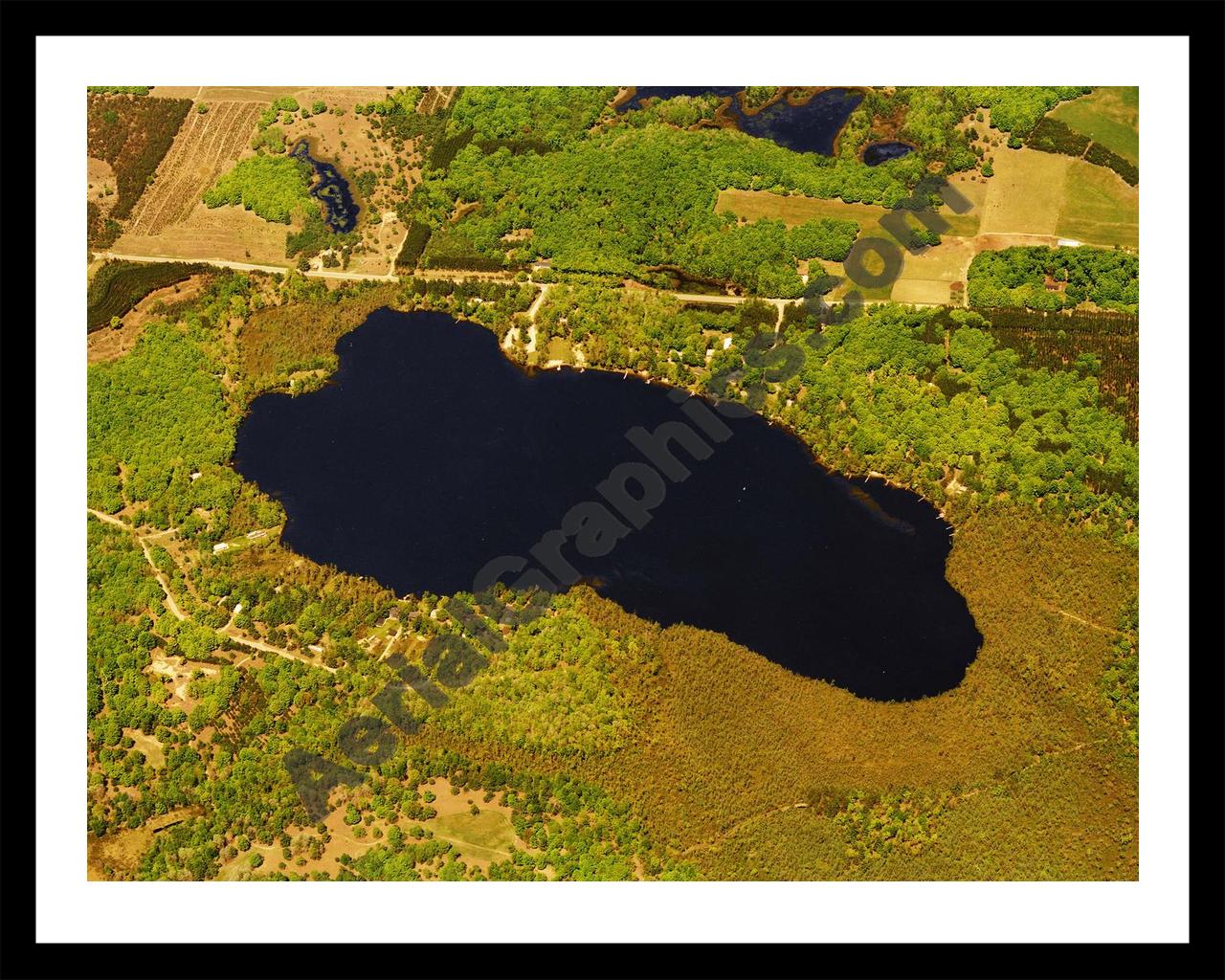 Aerial image of [5756] East Lake in Kalkaska, MI with Black Metal frame