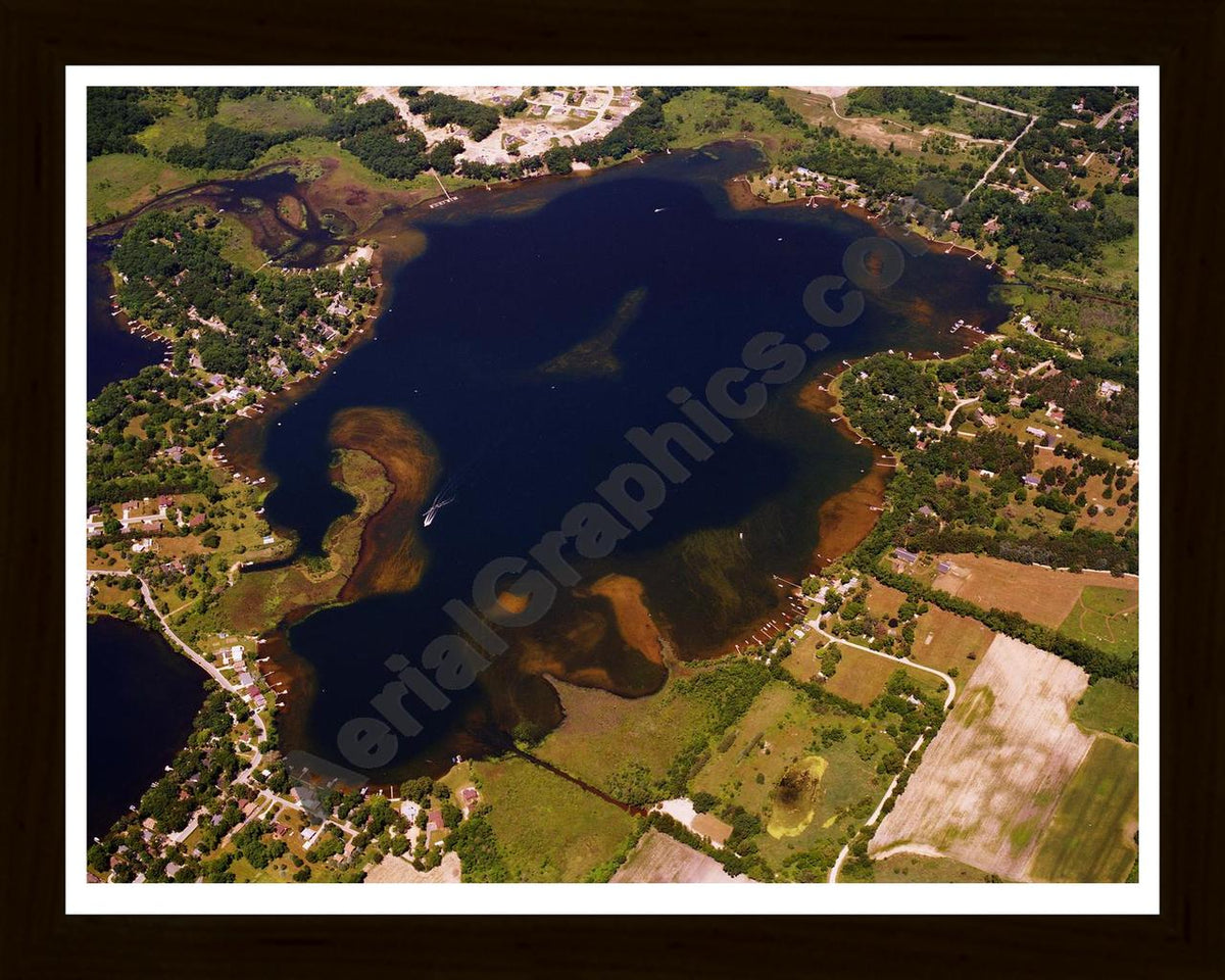 Aerial image of [5757] East Crooked Lake in Livingston, MI with Black Wood frame