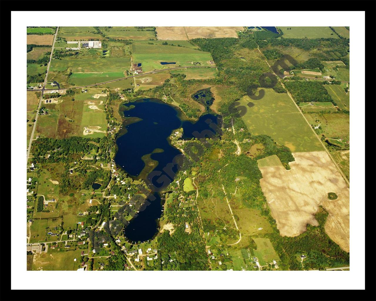 Aerial image of [5762] Elk Lake in Lapeer, MI with Black Metal frame