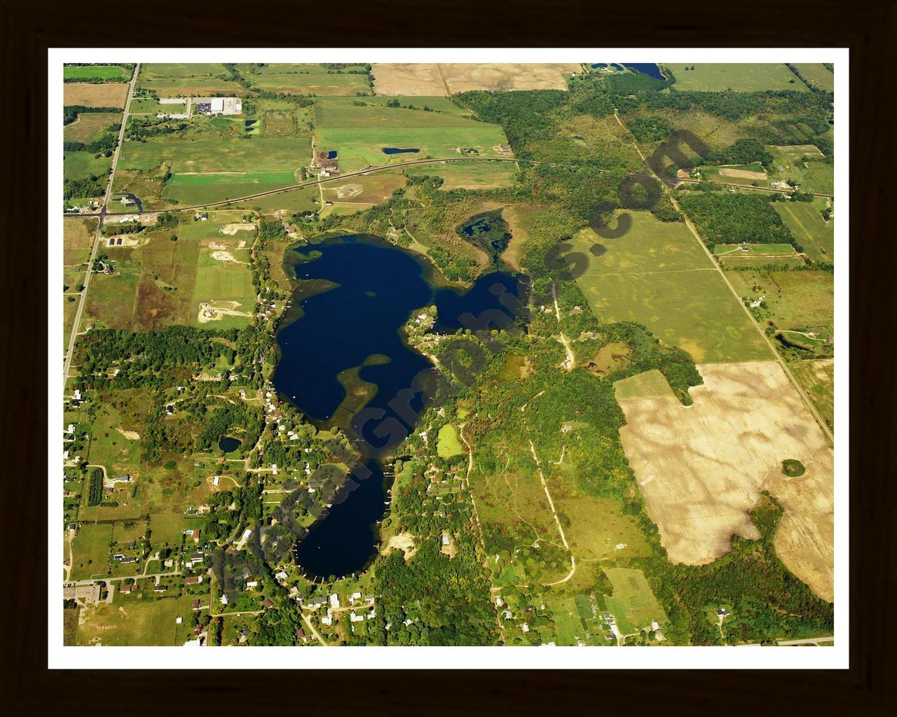 Aerial image of [5762] Elk Lake in Lapeer, MI with Black Wood frame