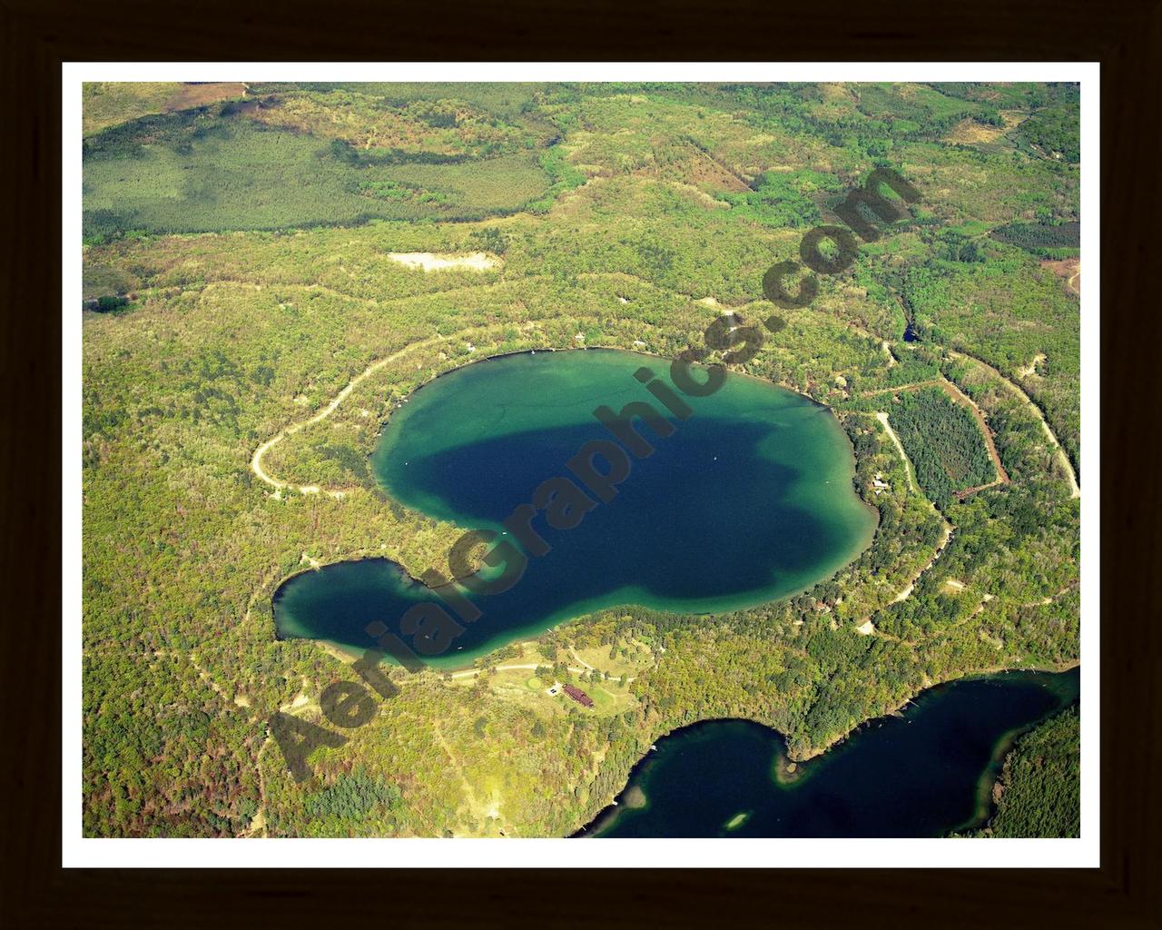 Aerial image of [5765] Ess Lake in Montmorency, MI with Black Wood frame