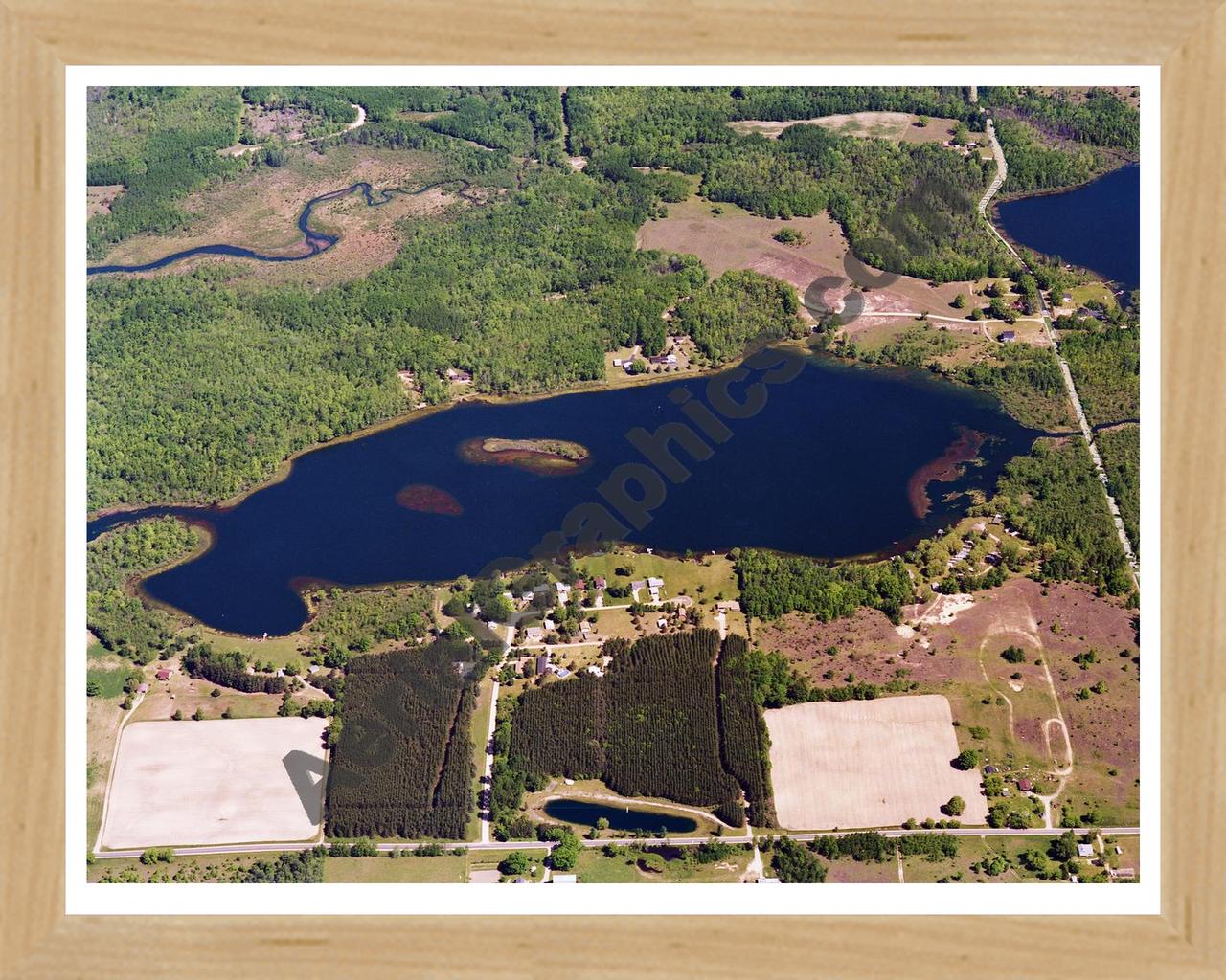 Aerial image of [5767] Fifth Lake in Montcalm, MI with Natural Wood frame