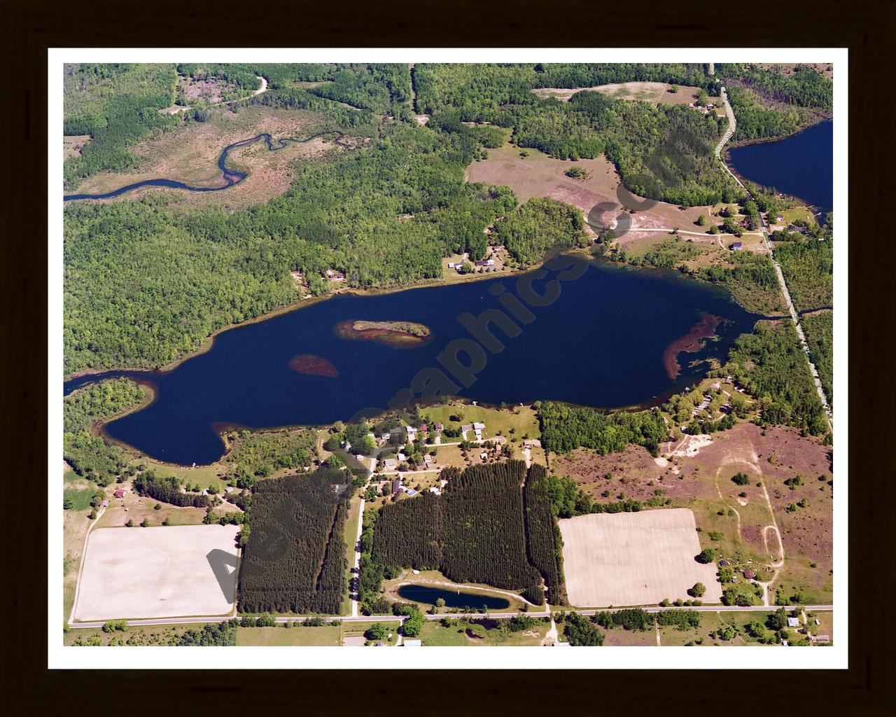 Aerial image of [5767] Fifth Lake in Montcalm, MI with Black Wood frame