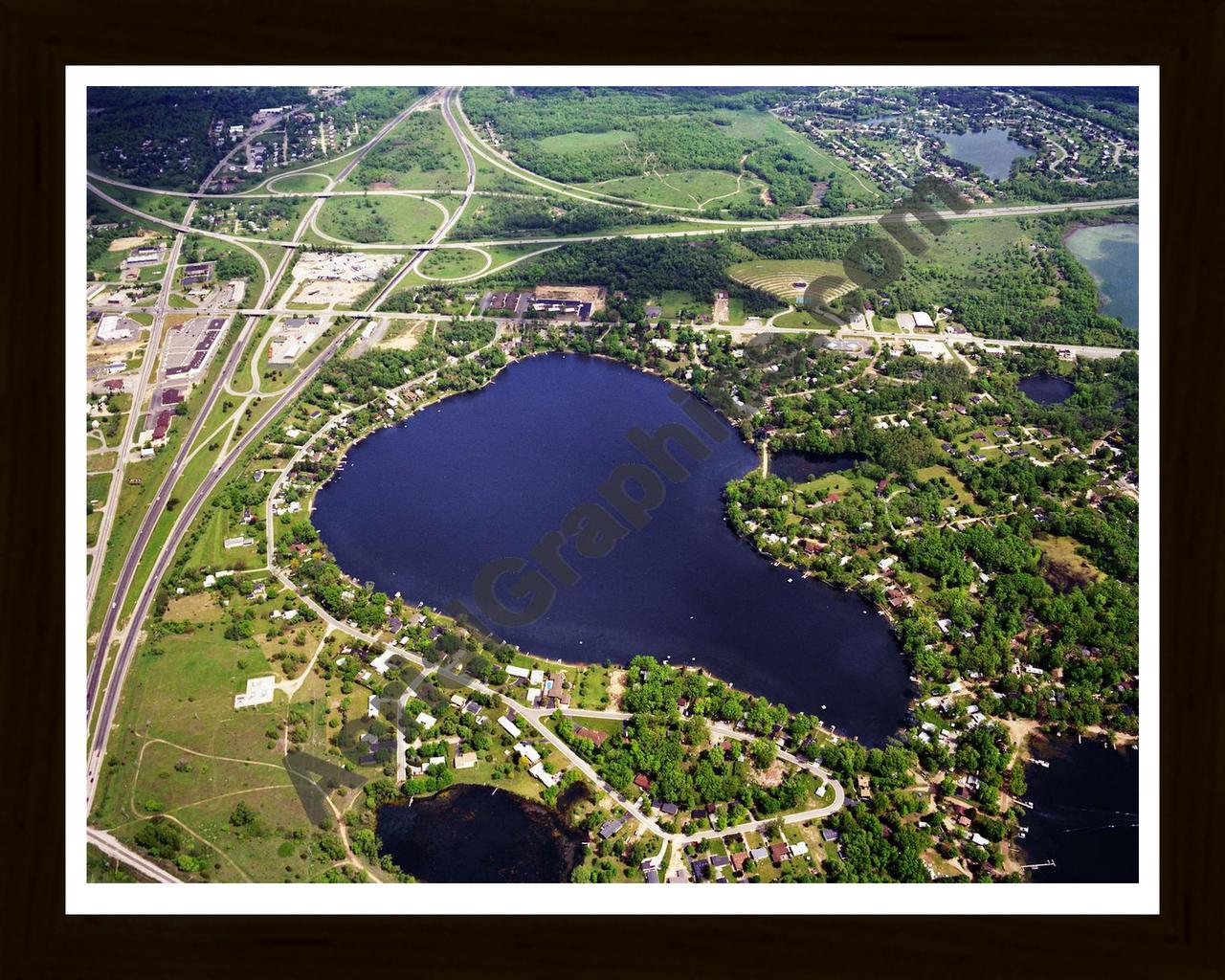 Aerial image of [5774] Fonda Lake in Livingston, MI with Black Wood frame