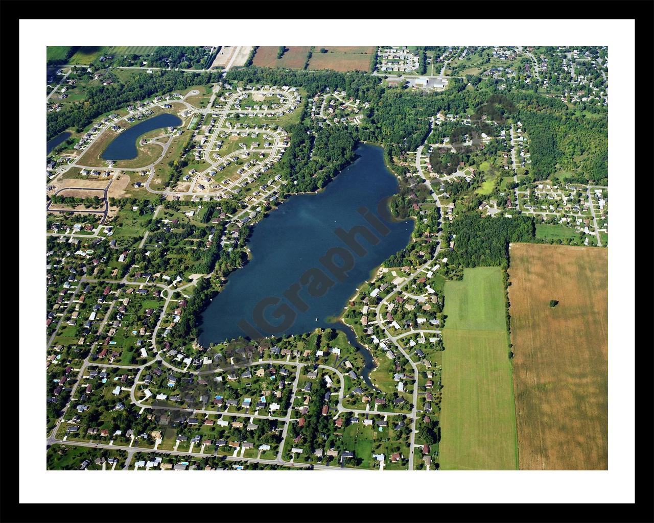 Aerial image of [5778] Lake Geneva in Clinton, MI with Black Metal frame