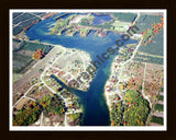 Aerial image of [5784] Lake Gitchegumee in Wexford, MI with Black Wood frame