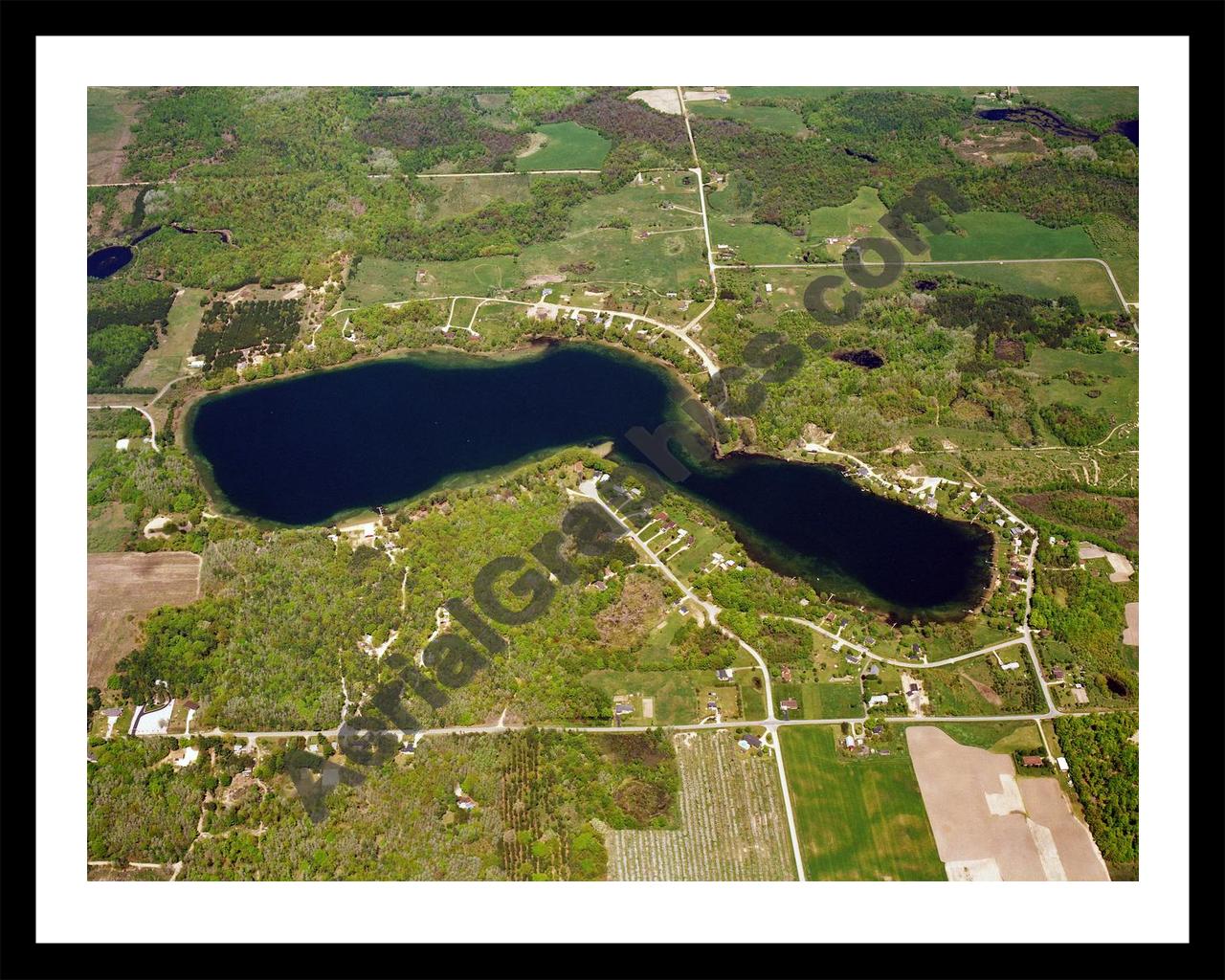 Aerial image of [5791] Hackert Lake  in Mason, MI with Black Metal frame