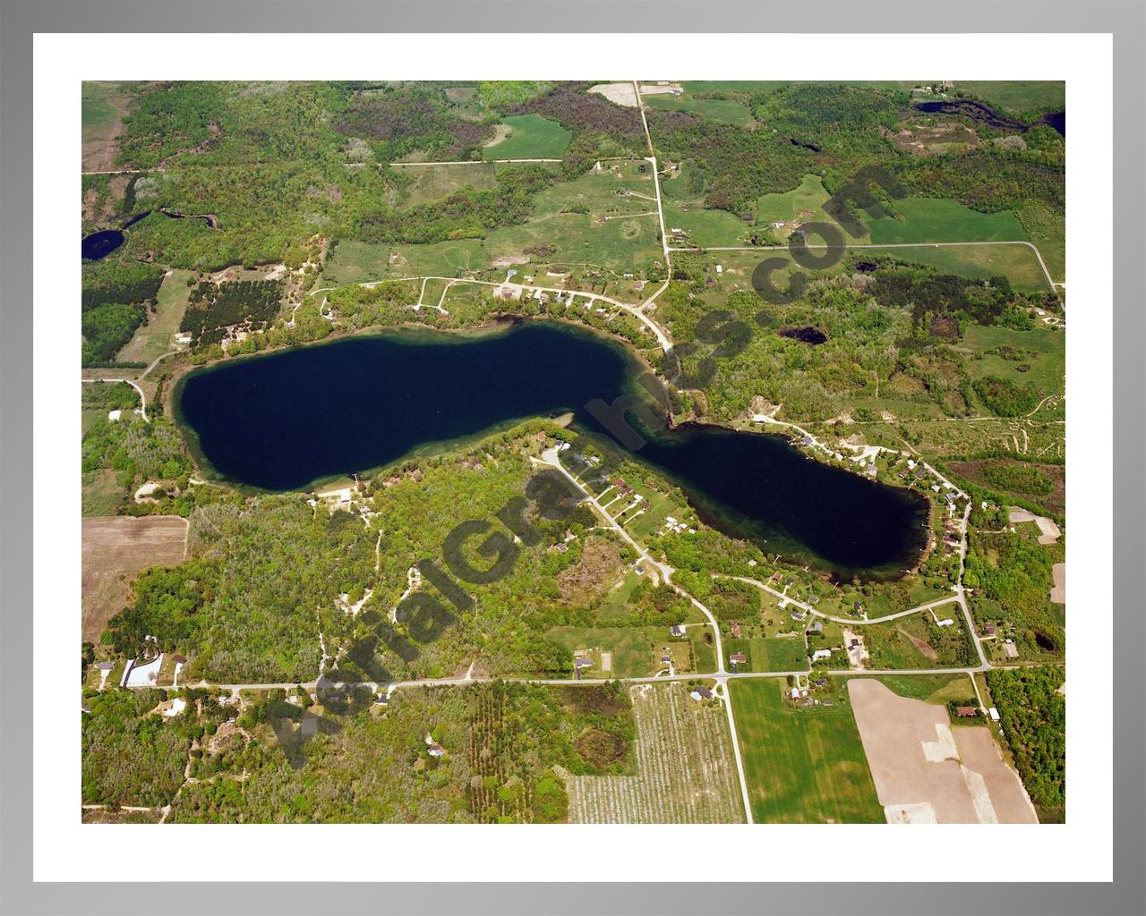 Aerial image of [5791] Hackert Lake  in Mason, MI with Silver Metal frame