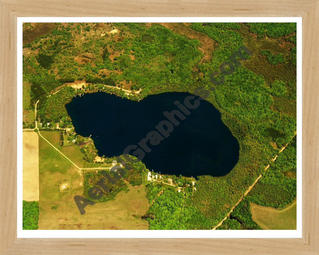 Aerial image of [5794] Halls Lake in Isabella, MI with Natural Wood frame