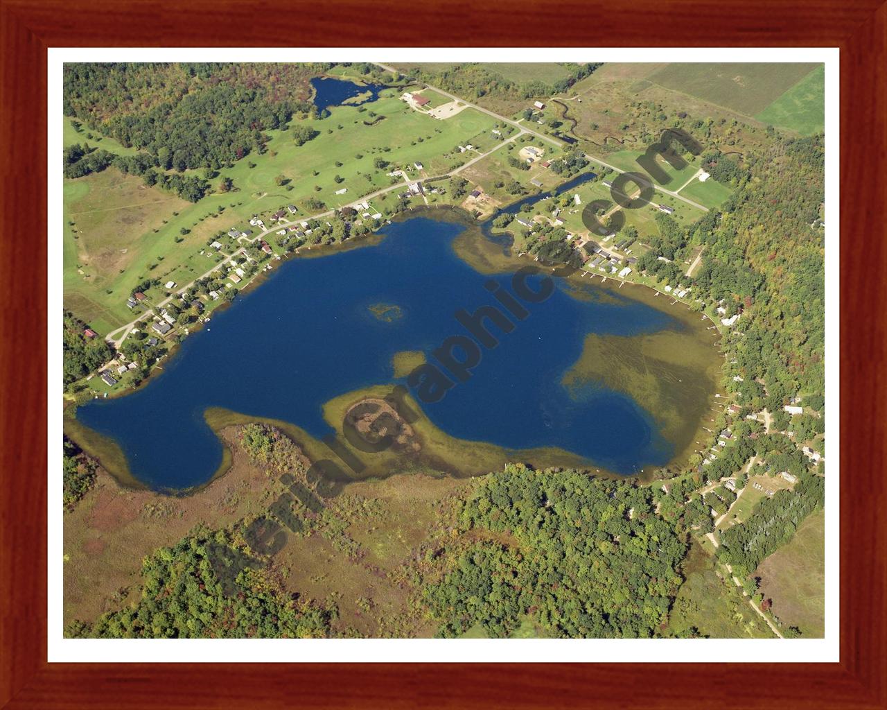 Aerial image of [5804] Holland Lake in Montcalm, MI with Cherry Wood frame