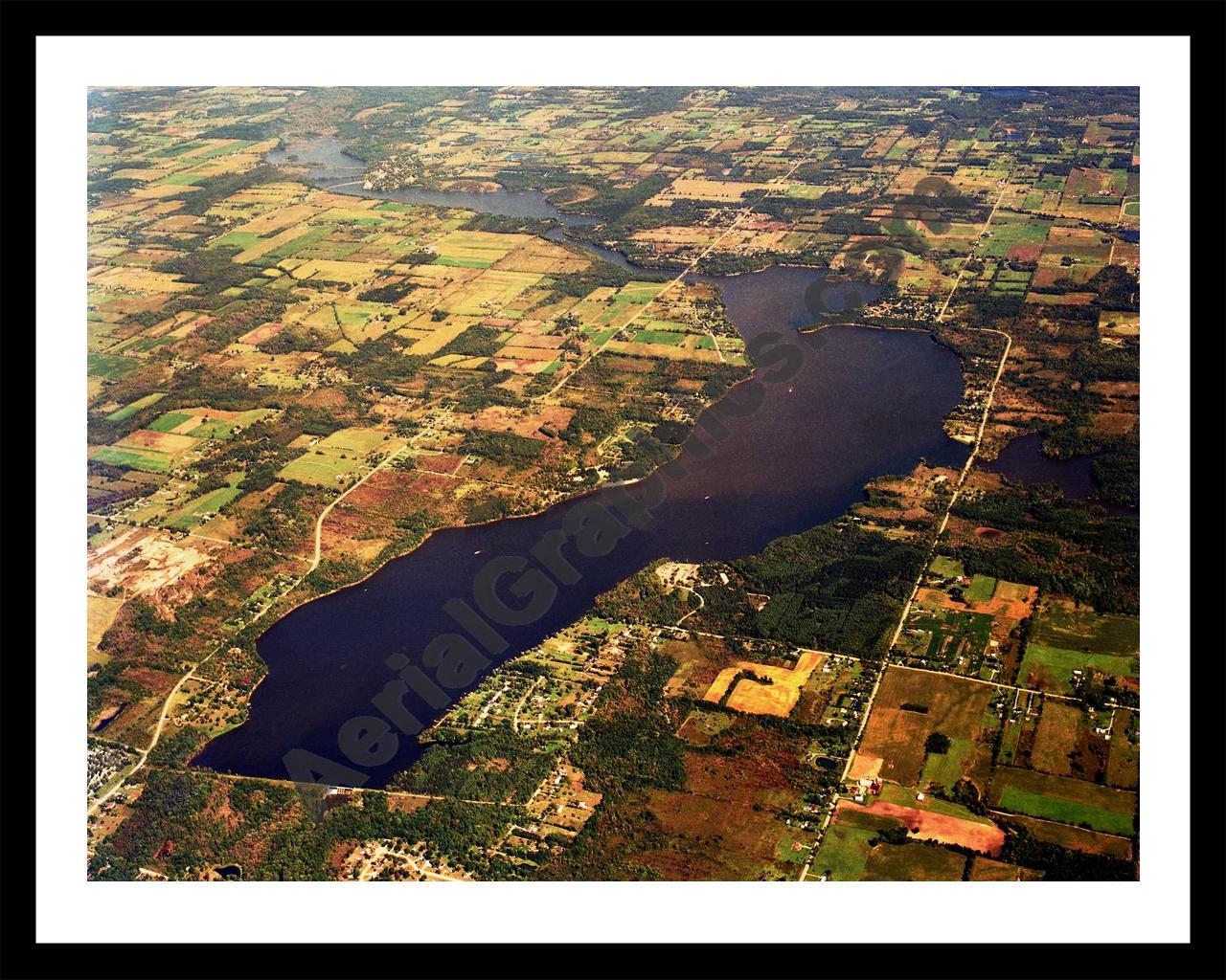 Aerial image of [5805] Holloway Reservoir in Lapeer, MI with Black Metal frame