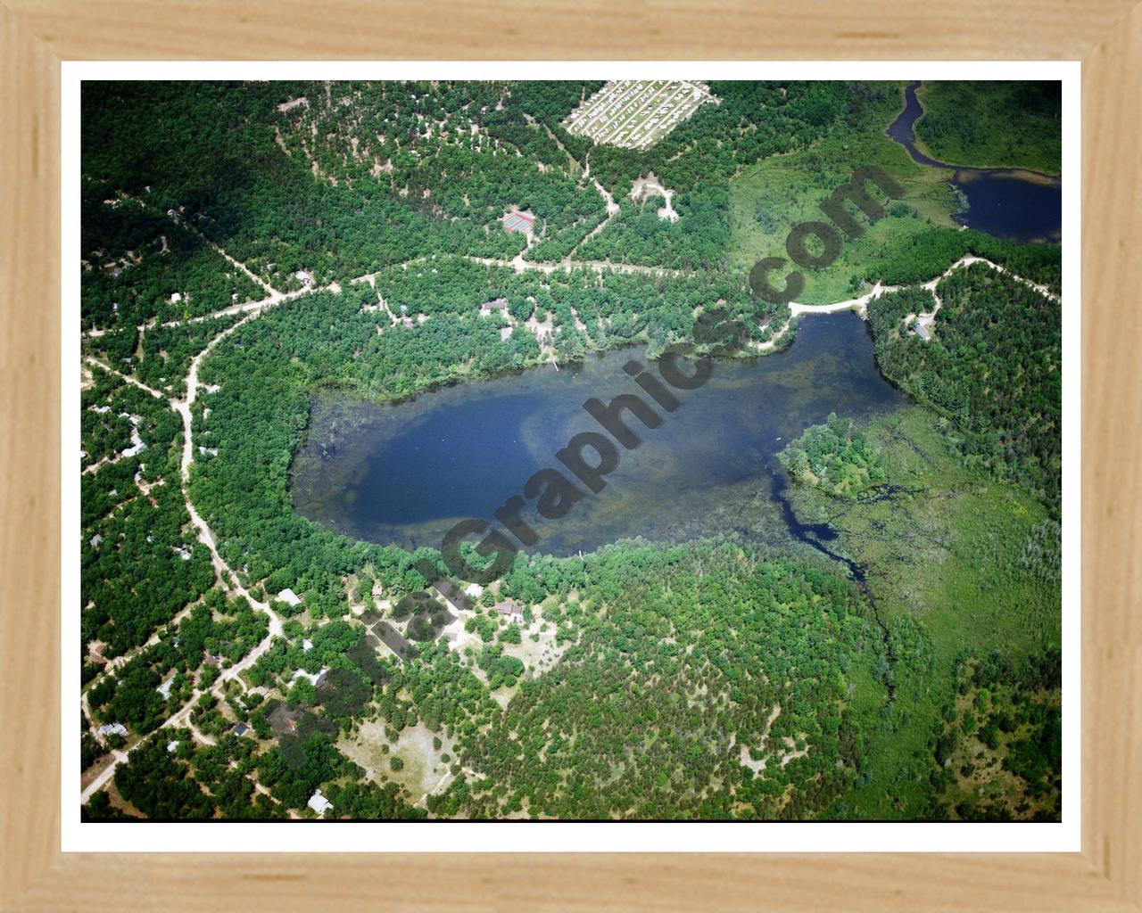 Aerial image of [5807] Wildfowl Lake in Montmorency, MI with Natural Wood frame