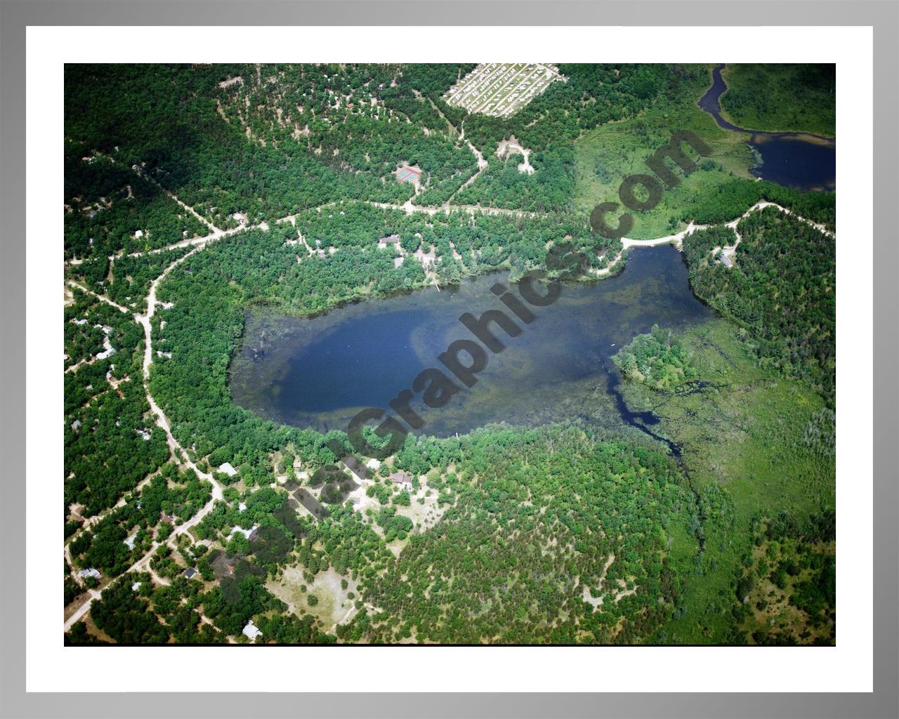 Aerial image of [5807] Wildfowl Lake in Montmorency, MI with Silver Metal frame